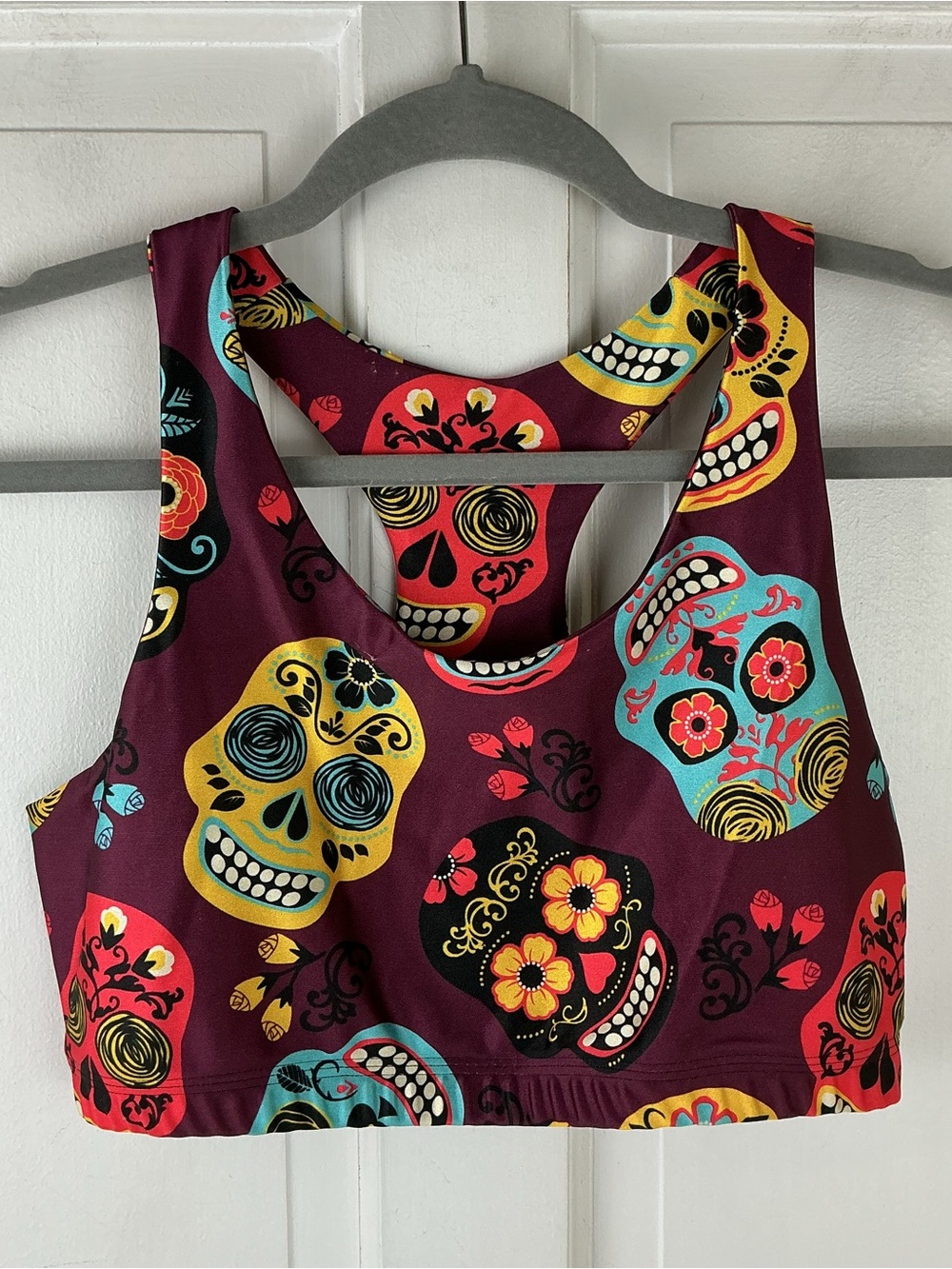 Racerback sports bra with a "Day of the Dead"